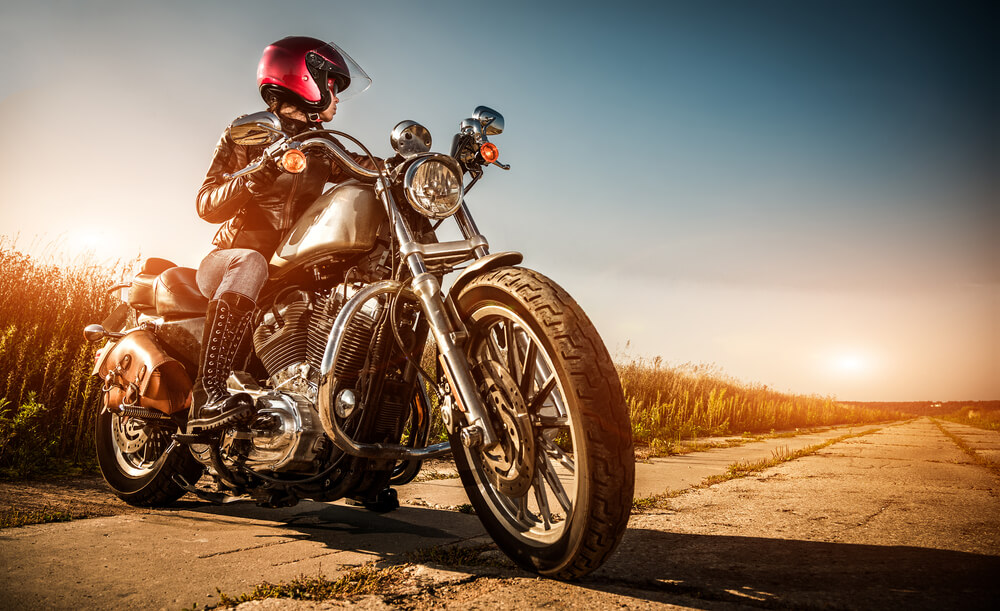 female motorcycle rider on the open road